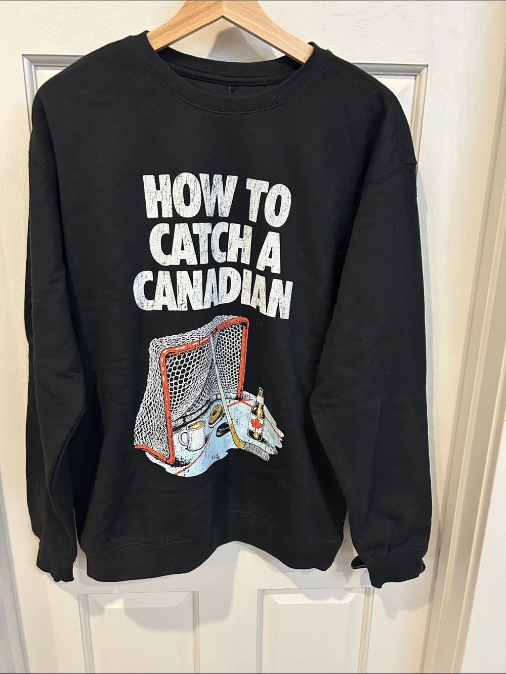 Black Graphic Crewneck Sweatshirt - How to Catch a Canadian